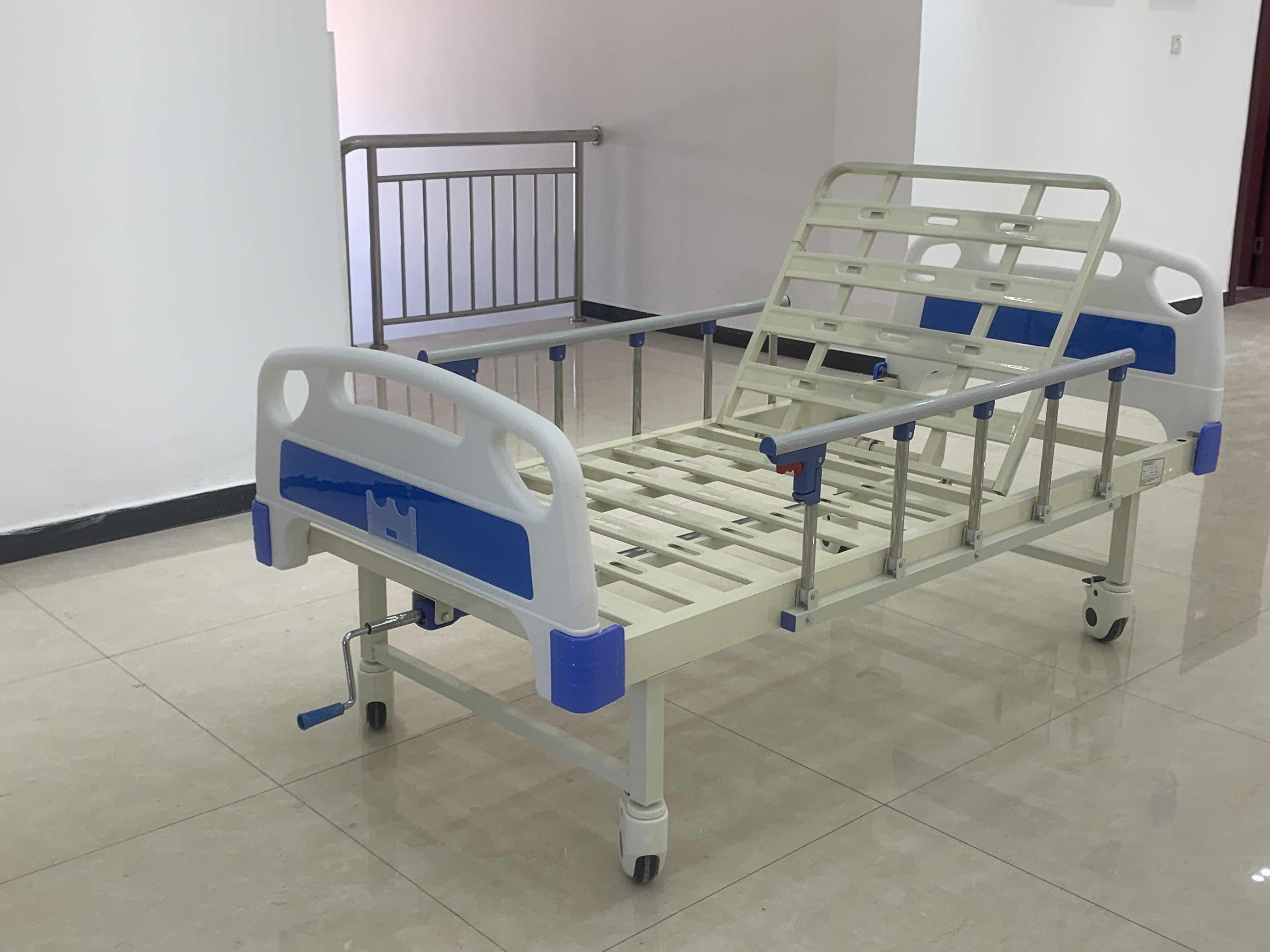 ABS single-shake hospital bed with guardrails, IV stand, and wheels