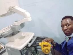 Local engineer repairing an ultrasound system on site